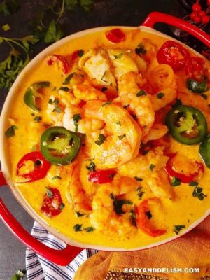  Moqueca de Camarão:  Kokeile Brasilian merenherkkua tuoreilla kasviksilla ja pihviksi kypsennettyjen katkarapujen kiehtovalla mausteseoksella!